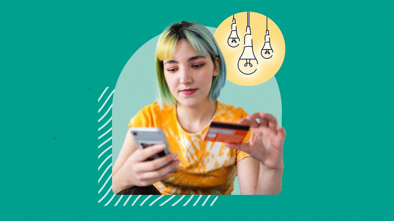 Woman entering credit card information on a phone