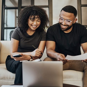 Planning, finance and couple with paper and laptop for budget