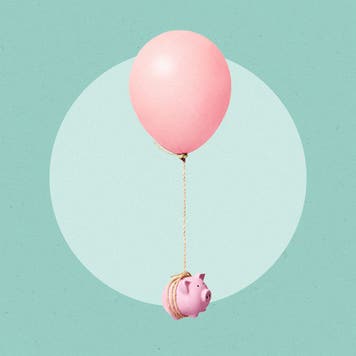 A piggy bank floating away attached to a large balloon