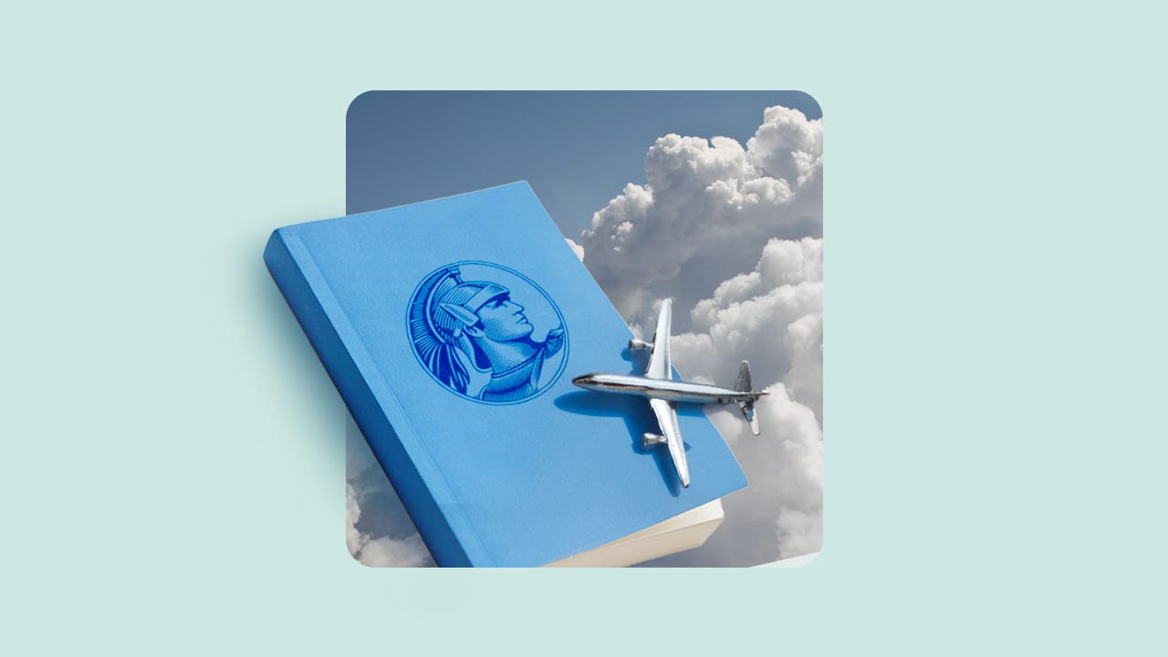 design element including an airplane flying over a book in the sky