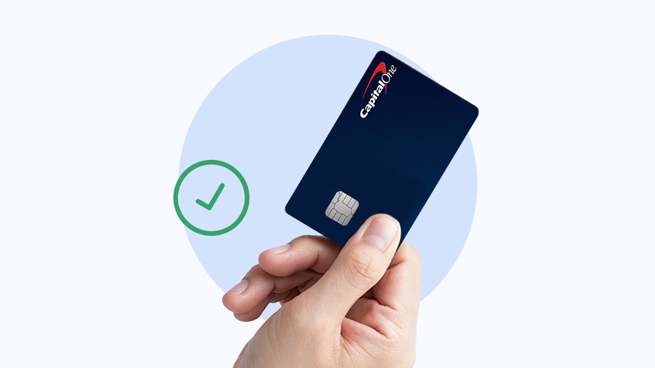 Design element of a hand holding a credit card