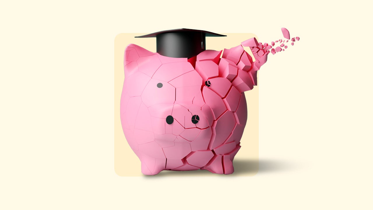 Front-facing pink piggy bank wearing graduation cap slowly cracking and disintegrating from one ear