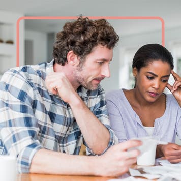 couple looking over some paperwork