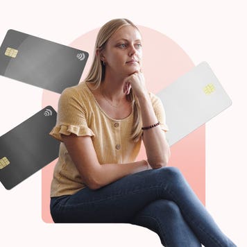 Design element of a person sitting with credit cards in the background