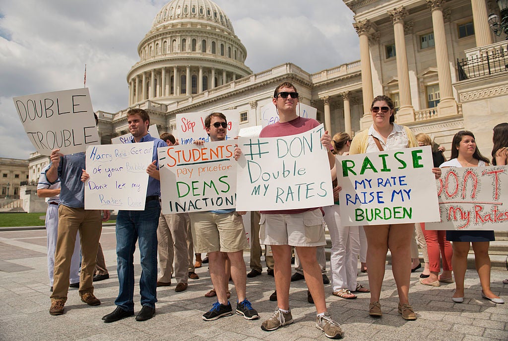 Interns from around the city protest near the Senate steps to urge the Senate to act on a House passed bill, Smarter Solutions for Students Act, which would prevent student loan interest rates from doubling.