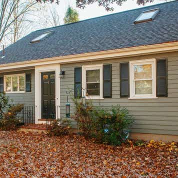 Wide shot of a home on the east coast during autumn
