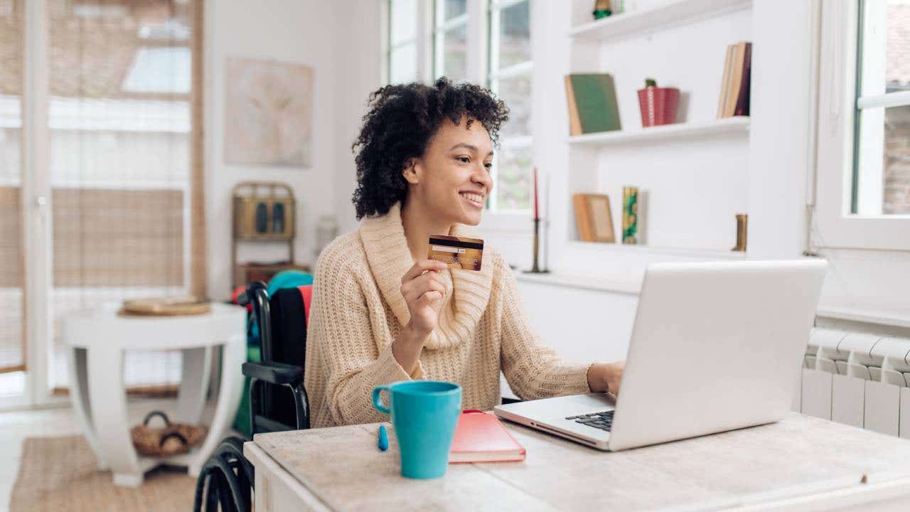 African-American woman in a wheelchair enjoying shopping online