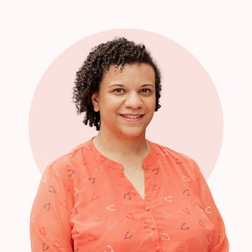 Shannon Martin, female insurance agent, smiling in bright-colored shirt