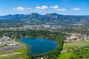 Aerial photo above Boulder Colorado on a clear day looking southwest at Hayden Lake