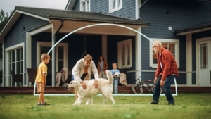 family in front of home
