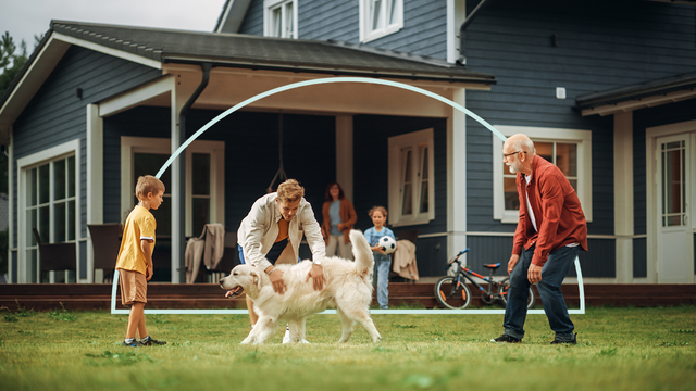 family in front of home