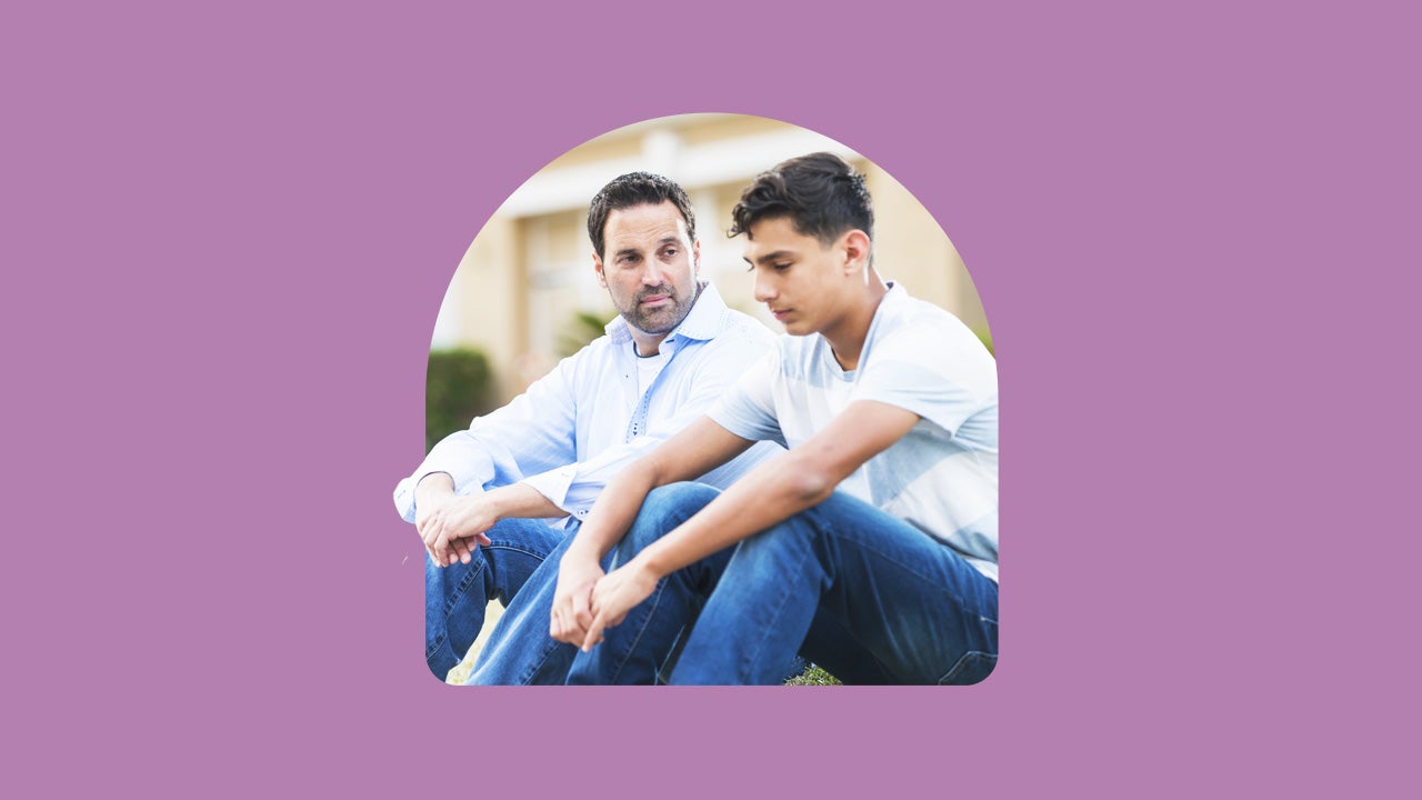 Father comforting son