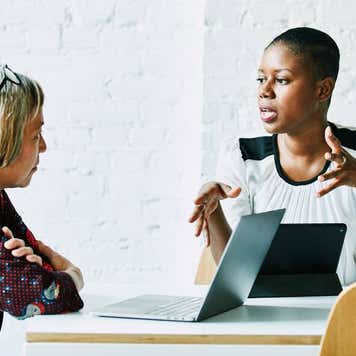 A financial advisor meets with a client.