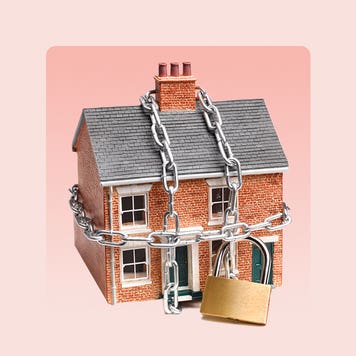 design element of a home with chains and a lock around it