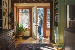 Man and woman arriving home