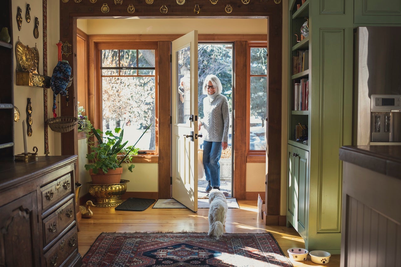 Man and woman arriving home