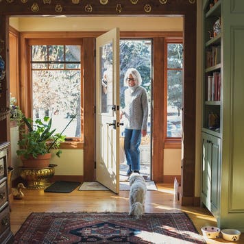 Man and woman arriving home
