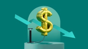 Dollar sign balloon being blown up by a pump on a green background with an arrow pointing down to the right