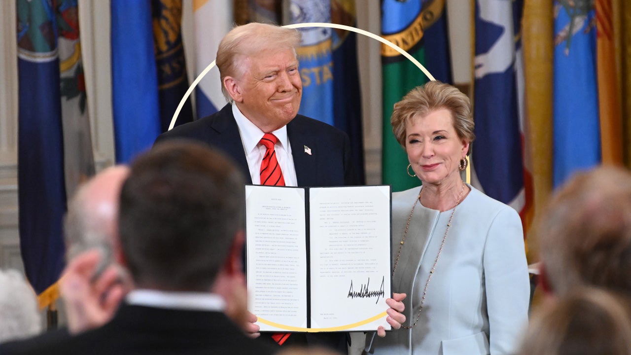 design image of donald trump holding a signed piece of policy