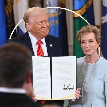 design image of donald trump holding a signed piece of policy