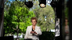 Education Department secretary Linda McMahon looks at her watch during a press conference