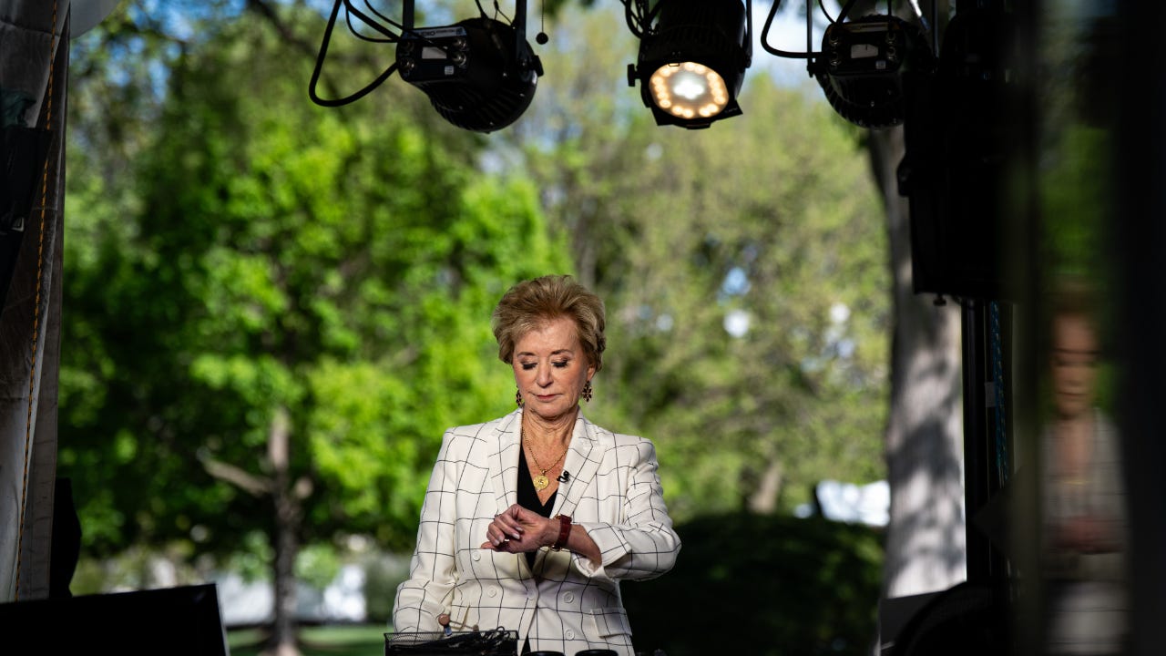 Education Department secretary Linda McMahon looks at her watch during a press conference