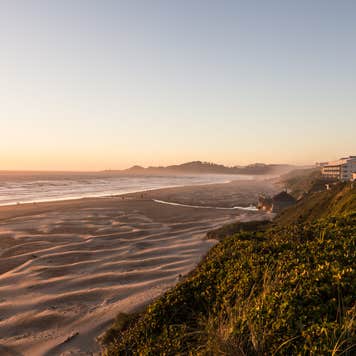 Sunset over the beach and the Pacific ocean in Newport, a town along the 101 highway along the coast in Oregon, USA
