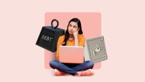 a woman sitting with a debt weight behind her and a safe