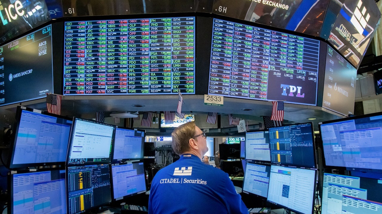 A trader works on the floor of the New York Stock Exchange (NYSE) in New York on Friday, June 20, 2025.