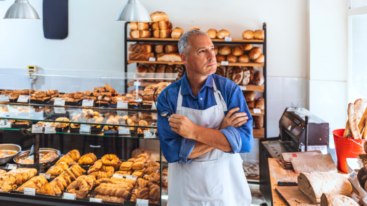 A bakery owner deep in thought.