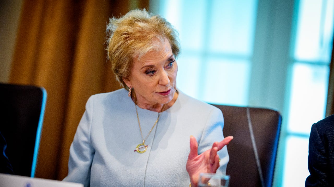 U.S. Department of Education Secretary Linda McMahon speaks to someone on her left.