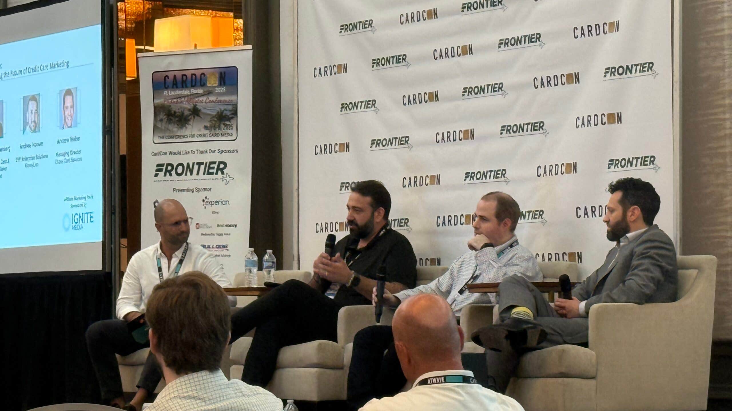 A financial panel presents at the CardCon 2025 conference