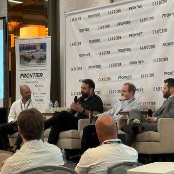 A financial panel presents at the CardCon 2025 conference