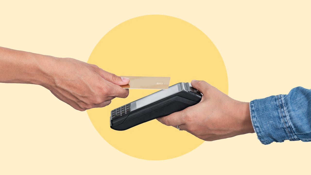 Design element displaying someone paying with a credit card