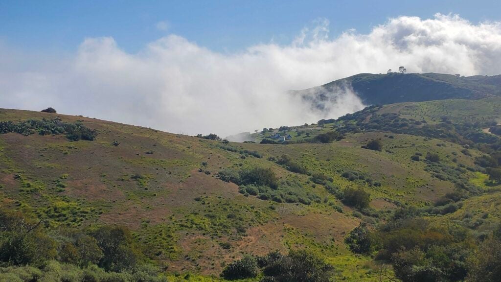 Clouds rolling through a valley in Catalina Island, California