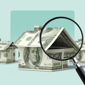 A house made of money, being looked at under a microscope.