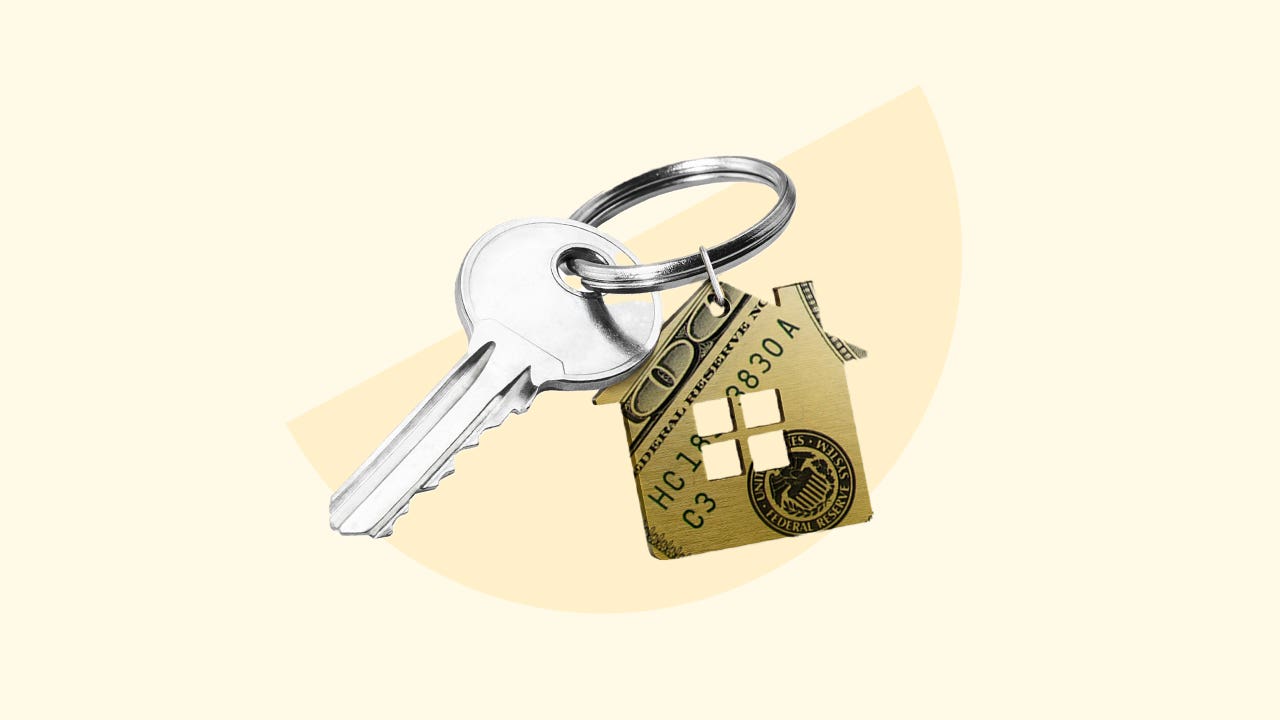 An image of a key that has a key chain of a stylized house made out of money.