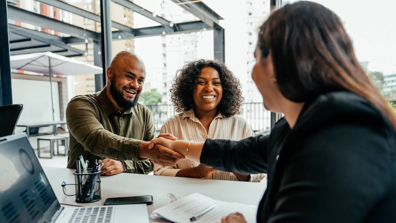 Couple meeting with a financial advisor.