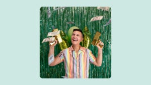 business owner celebrating with money in the air