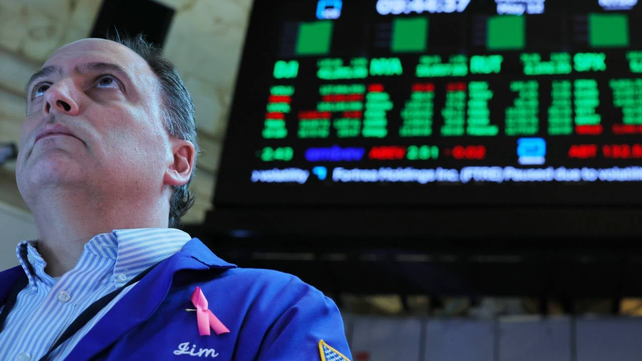 Traders work on the floor of the New York Stock Exchange during morning trading on May 12, 2025 in New York City. All three major stock indexes rallied at the opening of the stock market with the Dow Jones leading the way opening up over 1,000 points after the U.S. and China agreed to cut “reciprocal” tariffs by 115% for 90 days during ongoing negotiations.