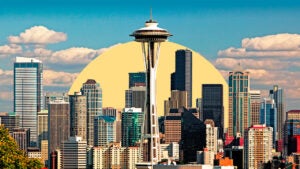 Seattle skyline with yellow and blue background