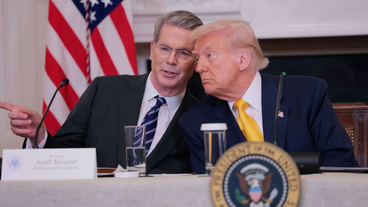 U.S. Secretary of Treasury Scott Bessent and U.S. President Donald Trump look on during The White House Digital Assets Summit in the State Dining Room of the White House on March 07, 2025 in Washington, DC. Trump held the summit to hear from crypto leaders on how his administration has invested in digital assets.