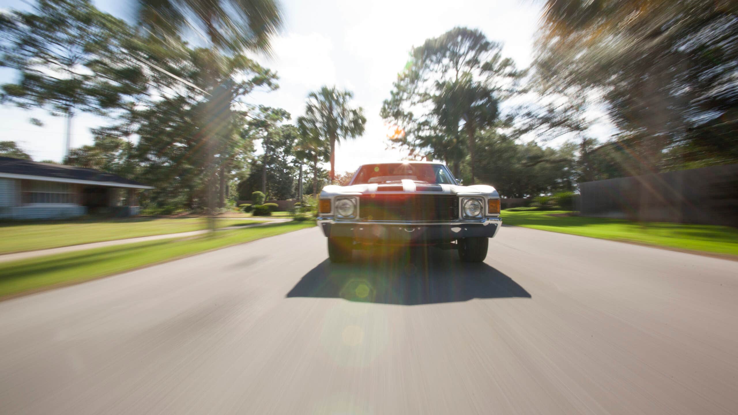 1970's car driving on a street