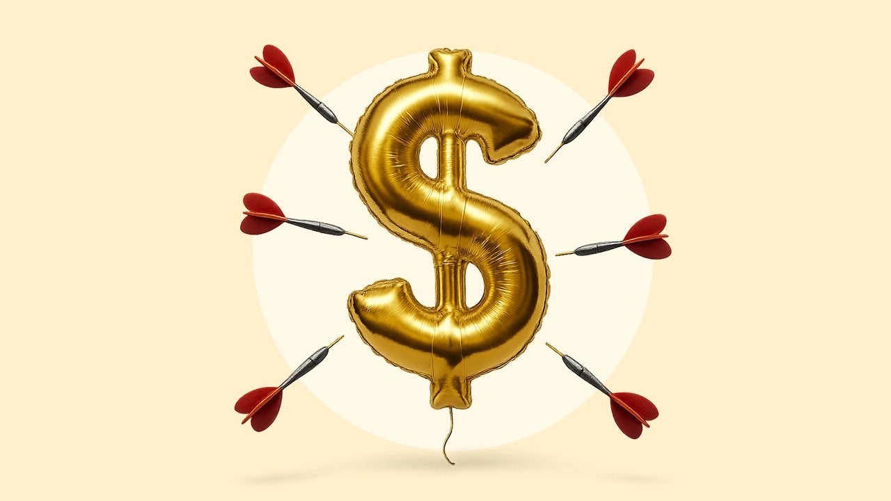 Design element displaying a balloon shaped as a dollar symbol with darts being directed at it.