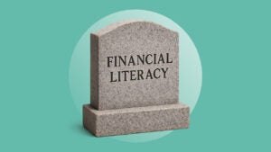 a tombstone with financial literacy words on it