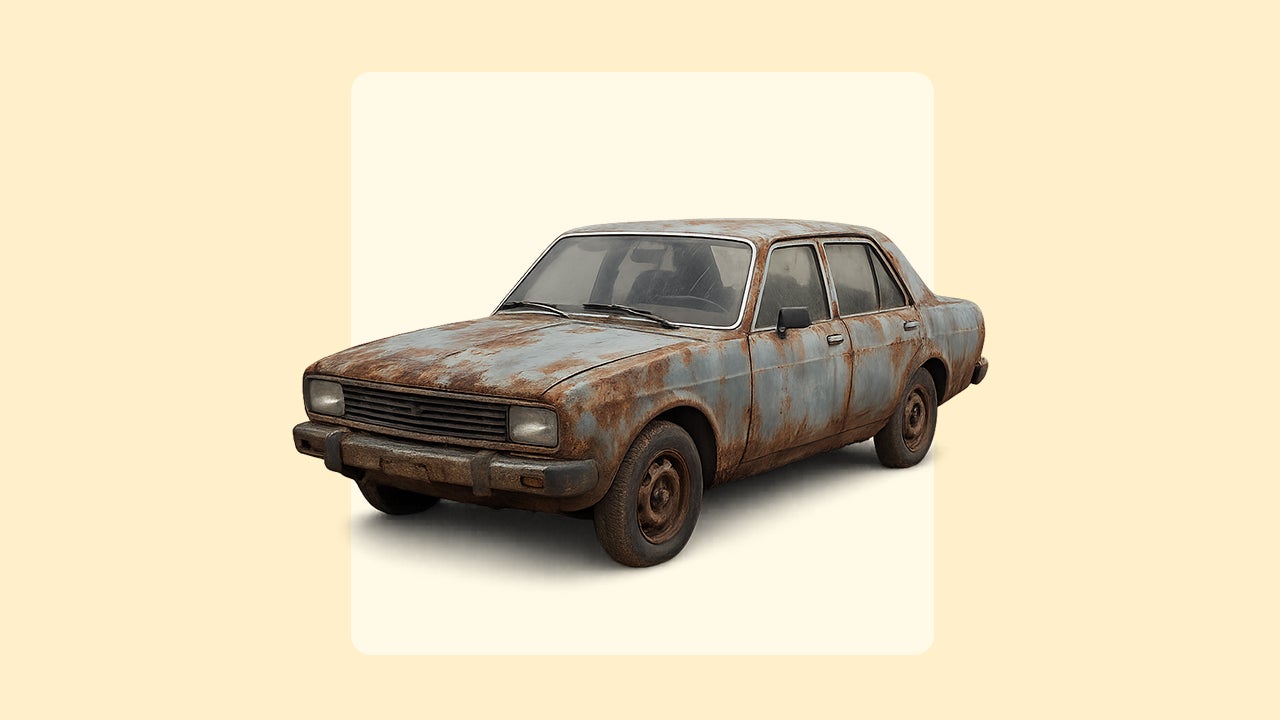An old, rusted sedan on a light yellow background.