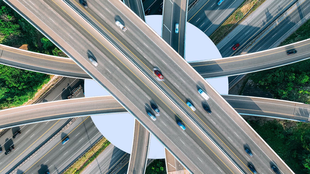 aerial view of vehicles traveling on crisscrossing highways
