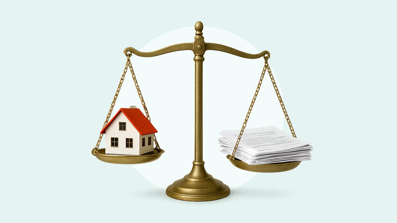home with scales of justice and papers