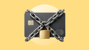 Design element of a credit card with a lock and chain wrapped around it.