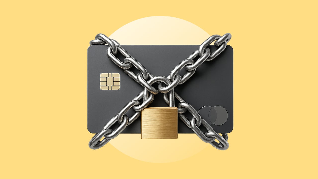 Design element of a credit card with a lock and chain wrapped around it.